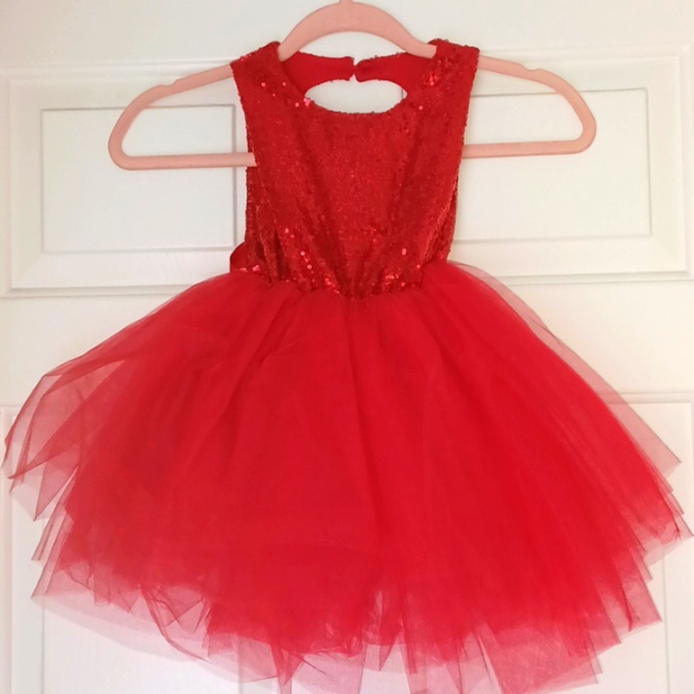 Sequin and tulle dress with heart shape back